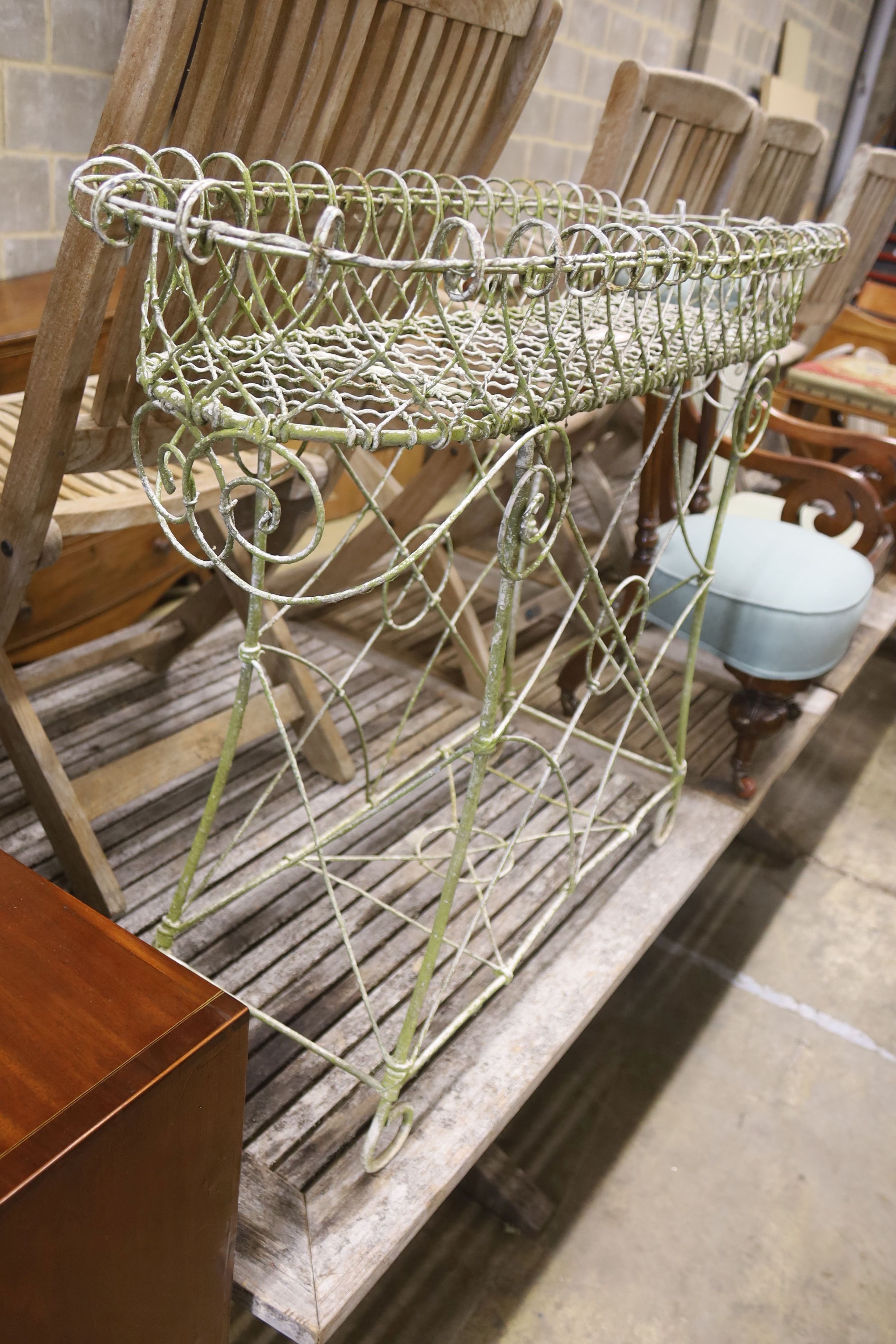 A Victorian wirework planter, width 100cm, depth 32cm, height 79cm